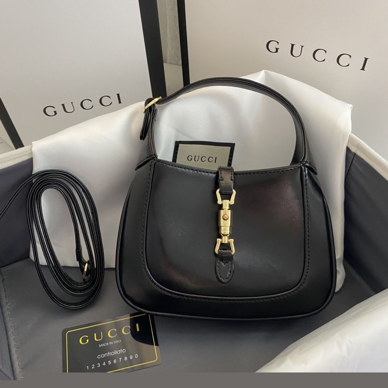 G*u*i top handle bags